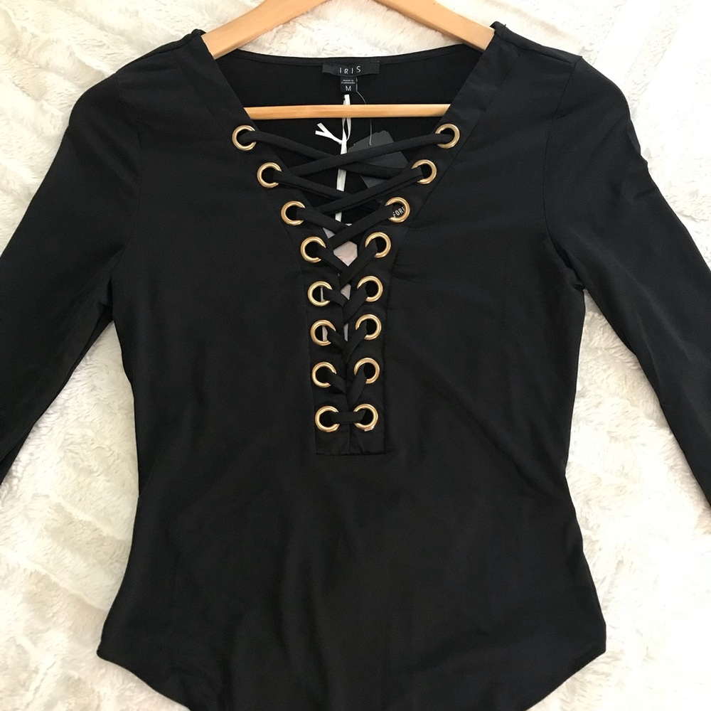 FOREVER 21 lace-up bodysuit. New with tags. Size M